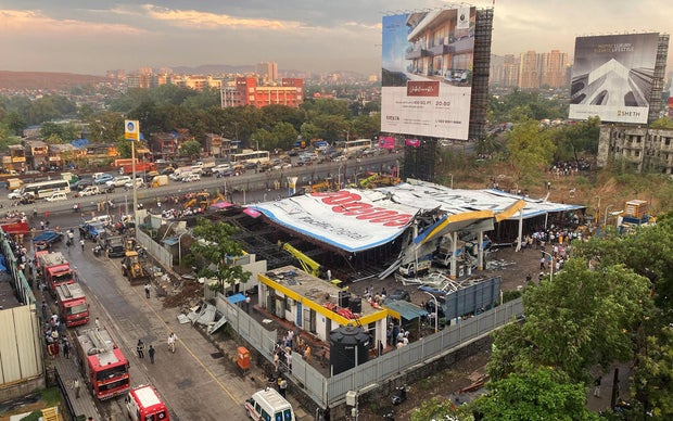 Huge billboard in Mumbai toppled by storm, killing more than a dozen people in India's financial capital