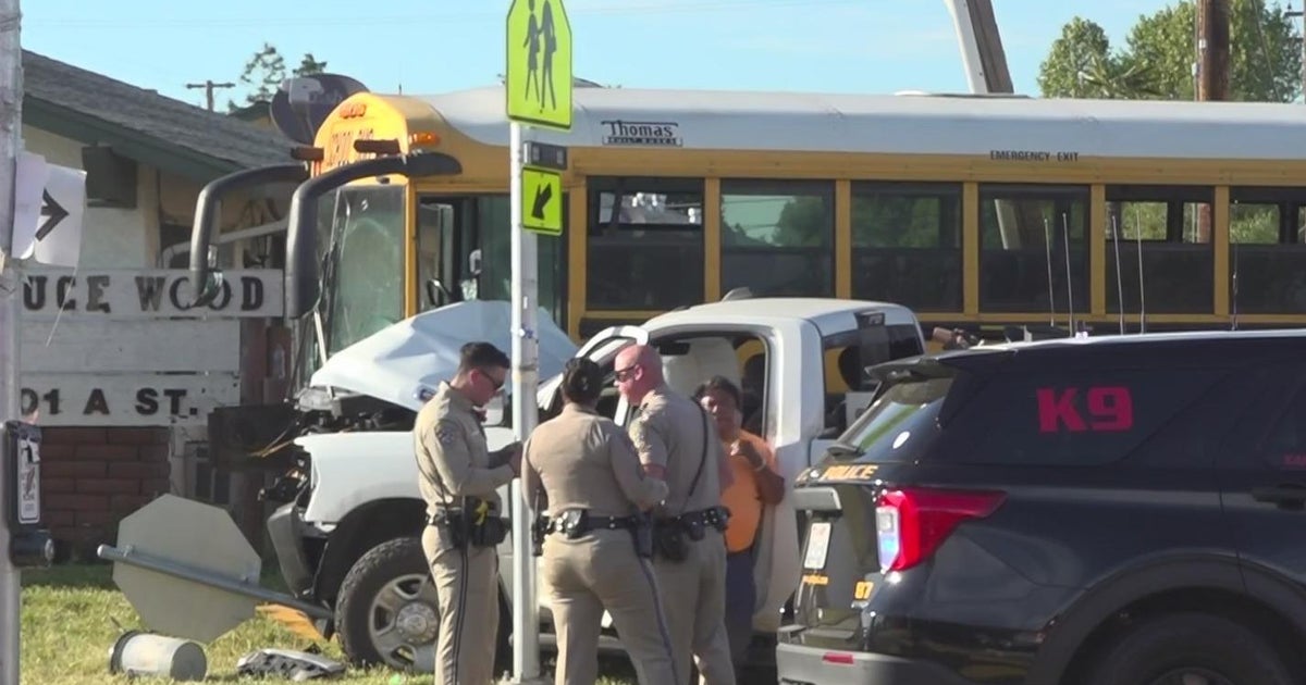 Truck driver in custody after crash with school bus in Galt