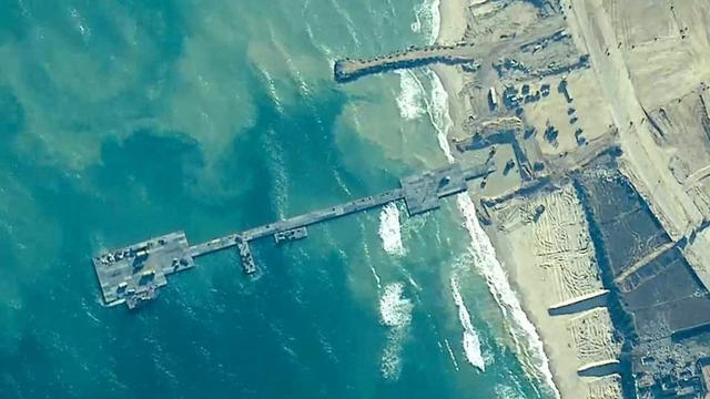 U.S. and Israeli militaries put temporary pier to deliver humanitarian aid on the Gaza coast 