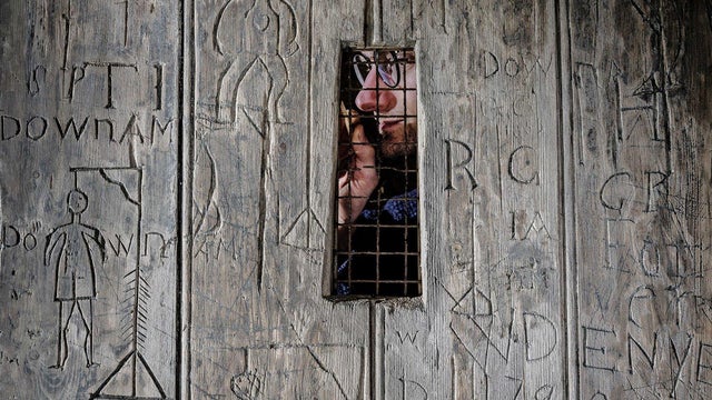 Soldiers' drawings — including depiction of possible hanging of Napoleon — found on 18th century castle door