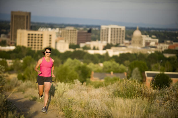 Woman running on trail in Boise, Idaho 