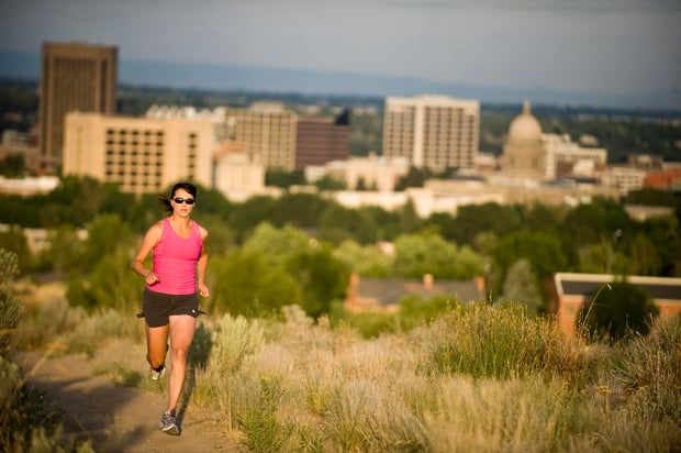 Woman running on trail in Boise, Idaho