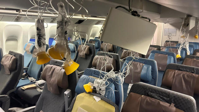 The interior of Singapore Airline flight SG321 is pictured after an emergency landing at Bangkok's Suvarnabhumi International Airport 