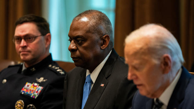 U.S. Defense Secretary Lloyd Austin listens as President Biden speaks during a meeting with the Joint Chiefs of Staff and combatant commanders in the Cabinet Room at the White House in Washington, May 15, 2024. 