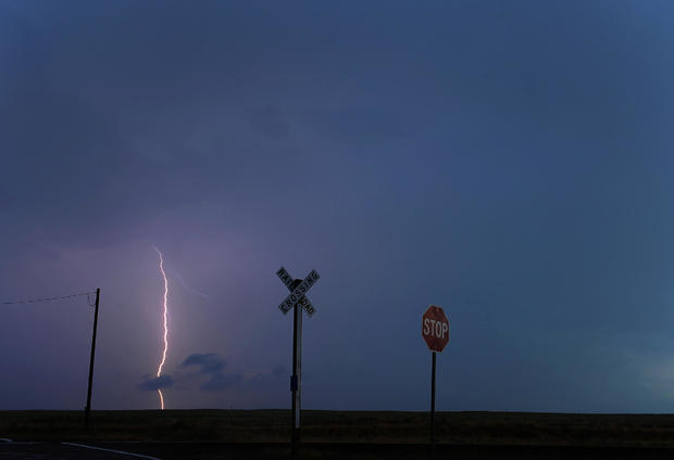 An electrical storm over rural Elbert County unleashed a bolt of lightning Tuesday night. July 12, 2011. Karl Gehring/ The Denver Post 