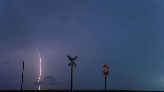 An electrical storm over rural Elbert County unleashed a bolt of lightning Tuesday night. July 12, 2011. Karl Gehring/ The Denver Post 