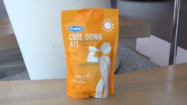 A orange bag that reads "cool down kit." 