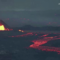 Erupting volcano in Iceland ignites "continuous curtain of fire"