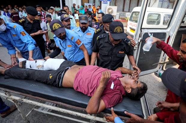 Bus carrying Hindu pilgrims to a shrine in India plunges down 150-foot gorge, killing 22 people