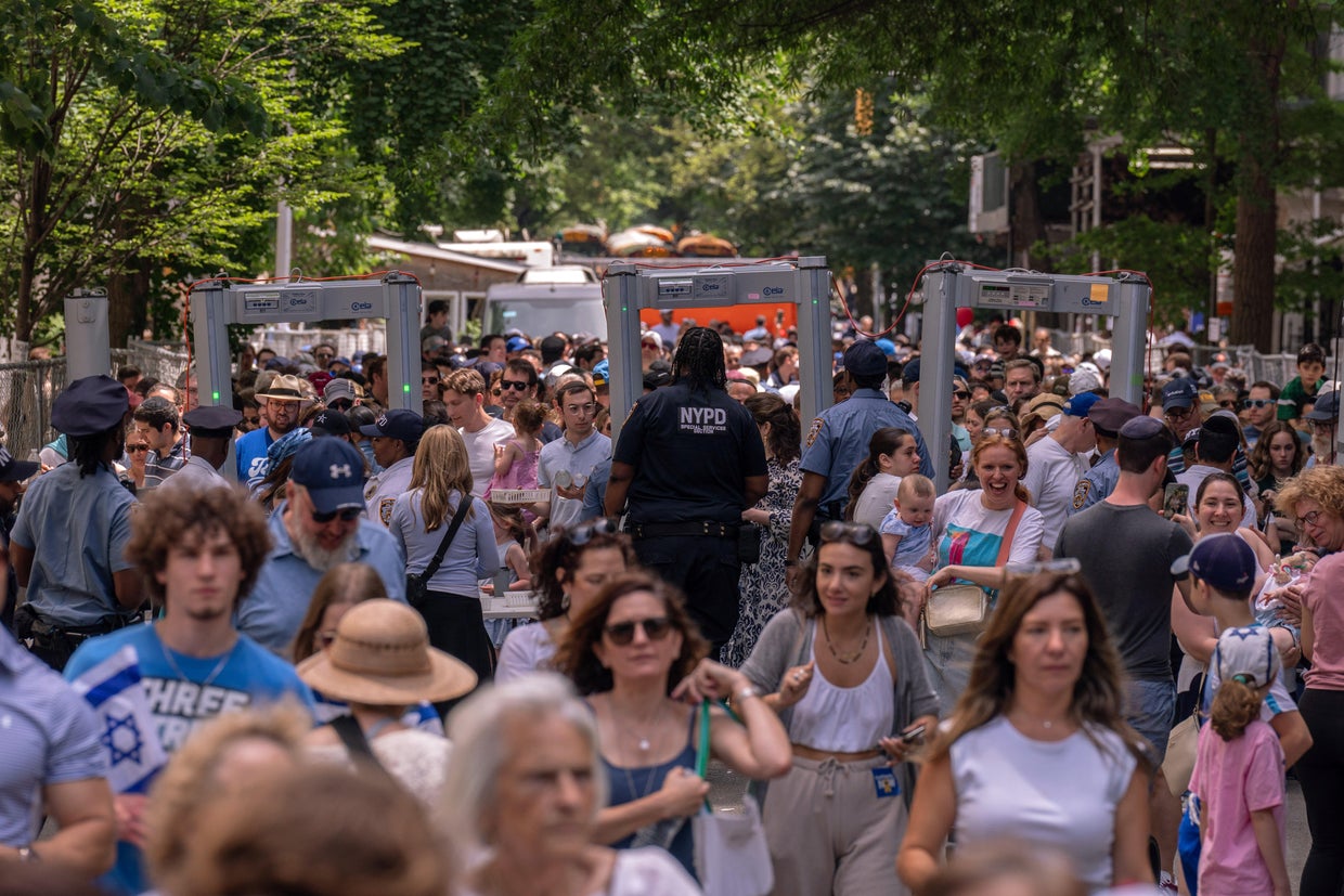 Crowds pass through metal detectors at the Israel Day on Fifth parade on June 2, 2024 in New York City.