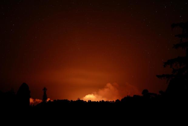 The plume from Kilauea volcano's eruption is seen during the early morning hours of June 3, 2024. 