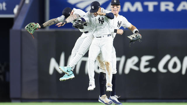 Alex Verdugo #24, Juan Soto #22, and Aaron Judge #99 of the New York Yankees celebrate defeating the Minnesota Twins at Yankee Stadium on June 05, 2024 in the Bronx borough of New York City. 