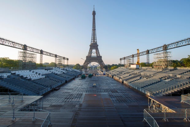 Olympic symbols revealed at the Eiffel Tower