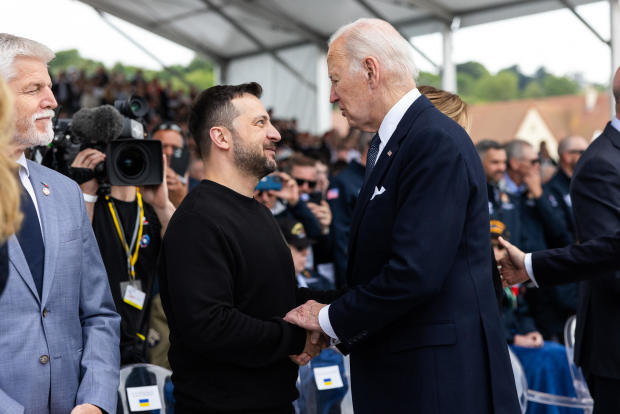 Ukrainian President Volodymyr Zelenskyy and President Biden take part in the official international ceremony commemorating the 80th anniversary of the Allied landings at the Omaha Beach Memorial in Normandy, France, on June 6, 2024. 