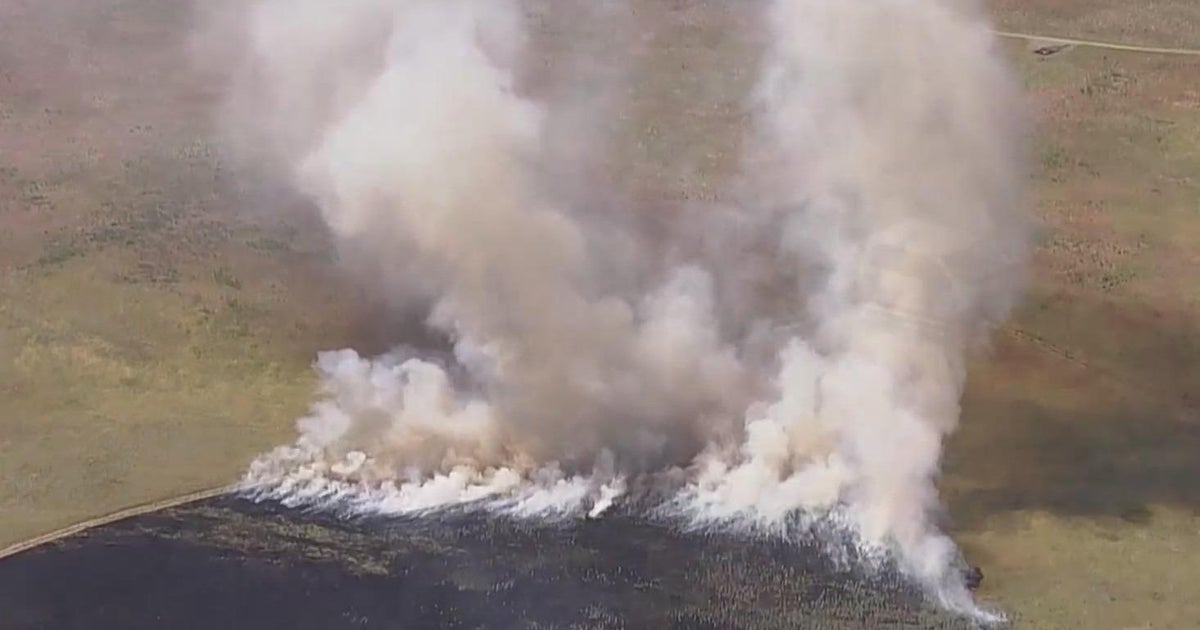 Brighton fire crews battle brush fire burning near Barr Lake - CBS Colorado