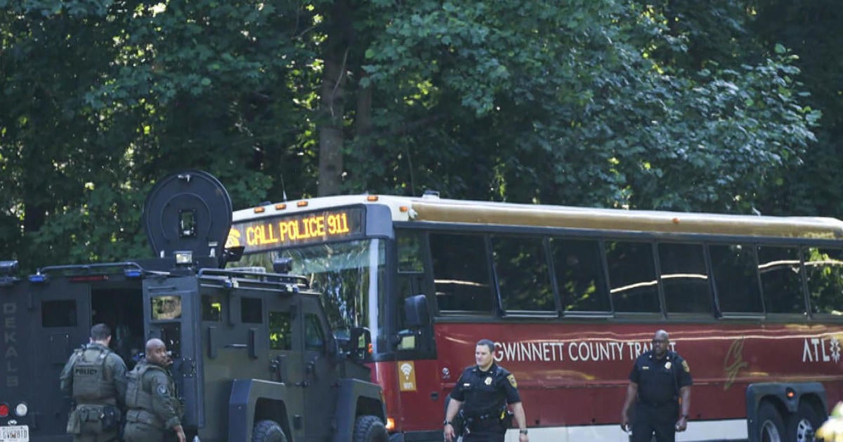 One person dies after hijacked commuter bus leads to police chase in ...