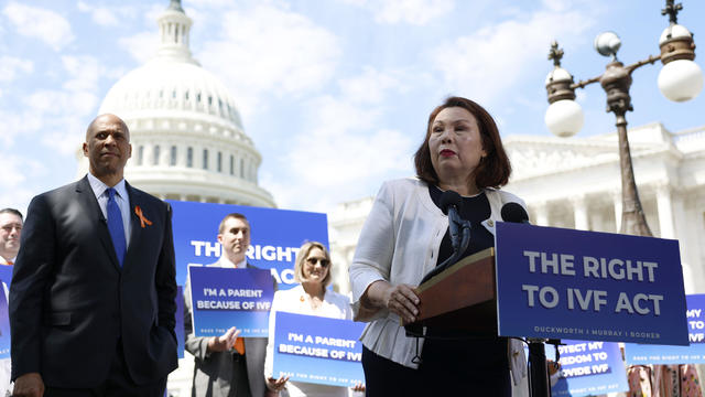 Sen. Tammy Duckworth speaks alongside Sen. Cory Booker during a news conference on access to in vitro fertilization (IVF) treatments outside of the U.S. Capitol Building on June 12, 2024 in Washington, DC. 
