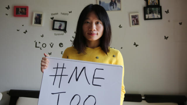Sophia Huang Xueqin, a freelance journalist who wants to raise peopleé??s awareness on sexual harassment in China, poses with a #MeToo sign at her home. 08DEC17 SCMP/Thomas Yau 