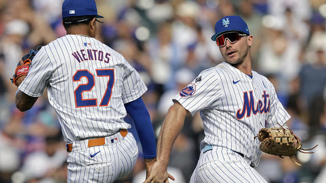 Pete Alonso #20 of the New York Mets and Mark Vientos #27 of the New York Mets celebrate after the Mets defeated the San Diego Padres at Citi Field on June 16, 2024 in New York City. 