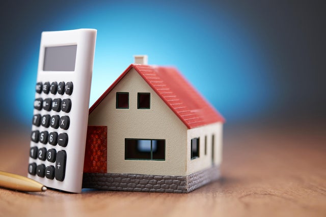 Model house with calculatoor and pencil,Malaysia