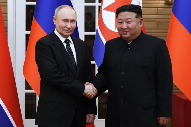 North Korean leader Kim Jong Un and Russian President Vladimir Putin shaking hands