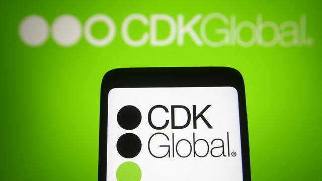 In this photo illustration, CDK Global logo is seen 
