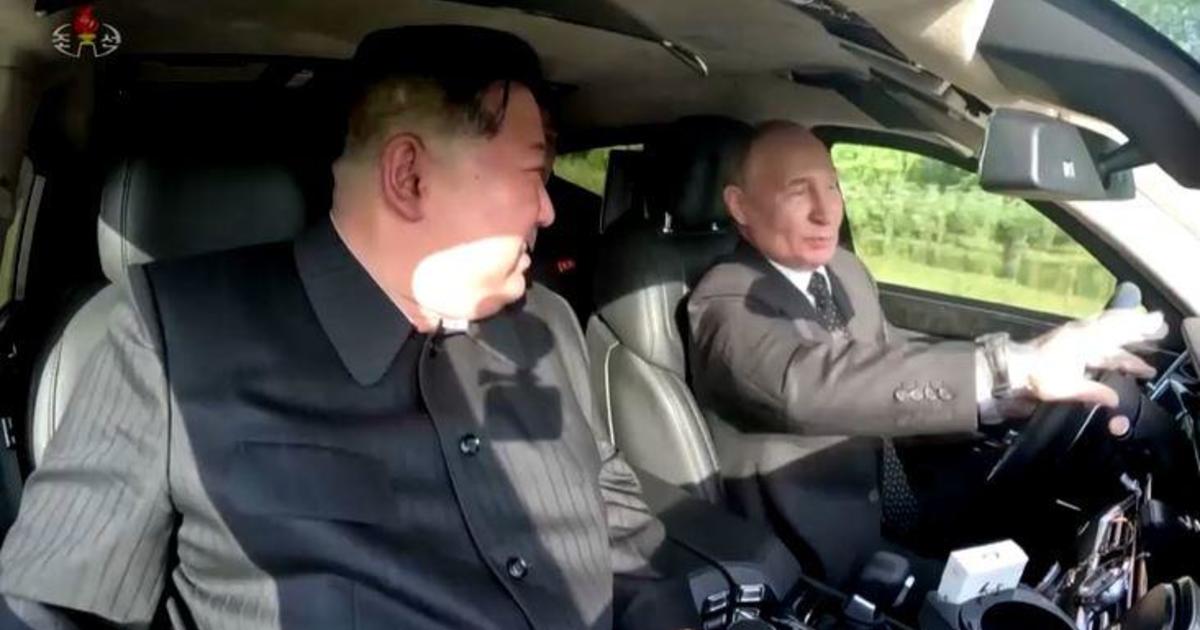 Photos show Kim Jong Un and Putin enjoying each other's gifts