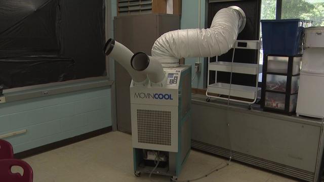 An air conditioning unit inside a classroom. 