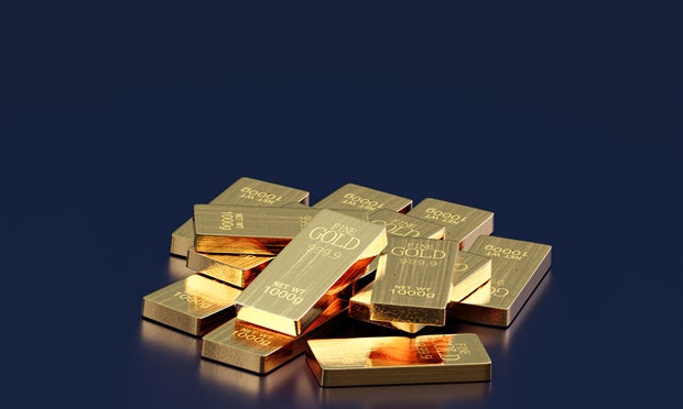 Gold bars on dark blue background. 3D render.
