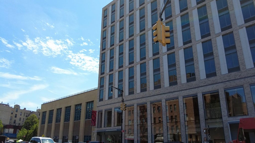 New apartment building above Inwood Library offers rents as low as $380. CBS New York takes an exclusive tour
