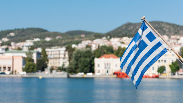 Greek national flag on back of boat, Mytilene, lesvos, Greece 