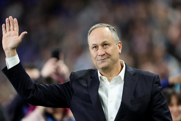 Second gentleman Doug Emhoff waves after lighting the torch before the 2024 NWSL Challenge Cup between the NJ/NY Gotham FC and the San Diego Wave FC at Red Bull Arena on March 15, 2024 in Harrison, New Jersey. 