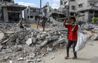 Palestinian children collect rubble for fuel amid growing hunger and fuel crisis 
