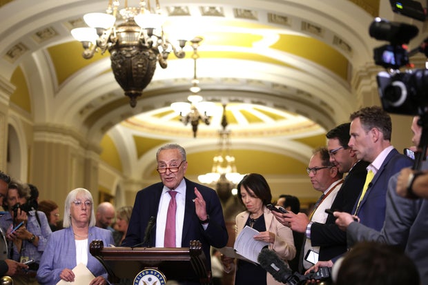 Senate Majority Leader Sen. Chuck Schumer speaks as Sen. Patty Murray and Sen. Maria Cantwell listen during a news briefing after a weekly Senate Democratic policy luncheon at the U.S. Capitol on July 9, 2024 in Washington, DC.