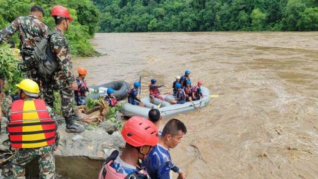 Rescue efforts ongoing for 65 missing in Nepal after landslide sweeps buses into river 