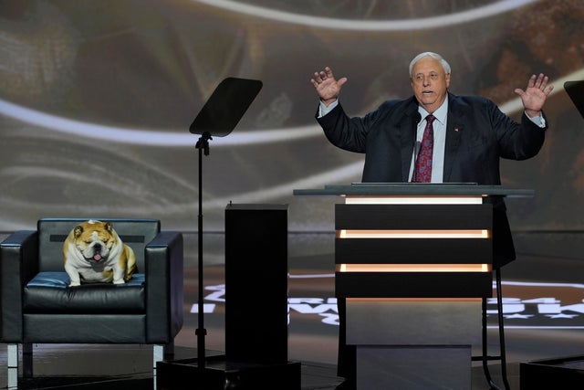 West Virginia Gov. Jim Justice, with his dog named Babydog, during the Republican National Convention on Tuesday, July 16, 2024, in Milwaukee. 