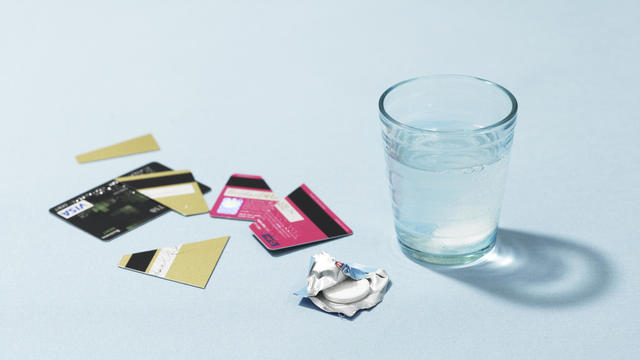 Credit cards and headache tablet 