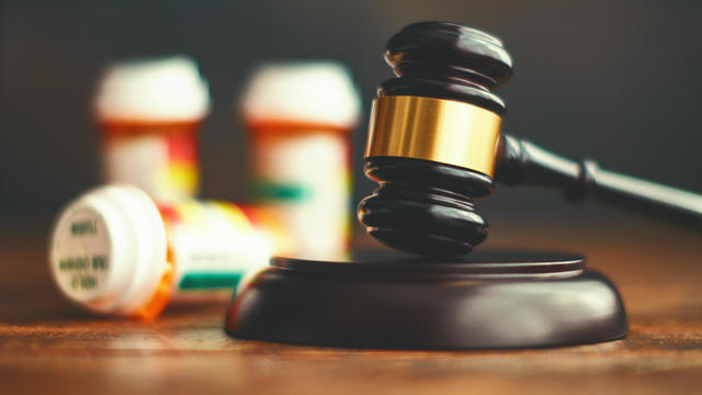 Judge's gavel with medications. Medical malpractice 