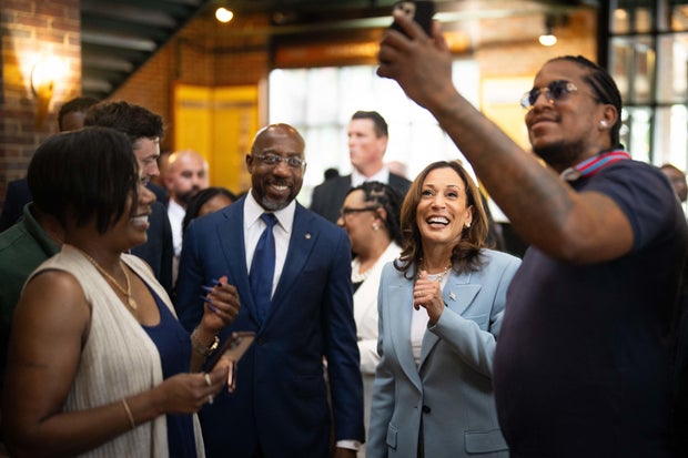 Kamala Harris poses for photos in Atlanta
