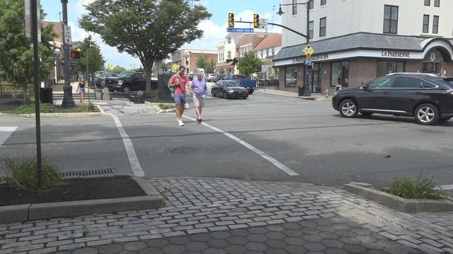 People drive and walk in Radnor Township, Pennsylvania 