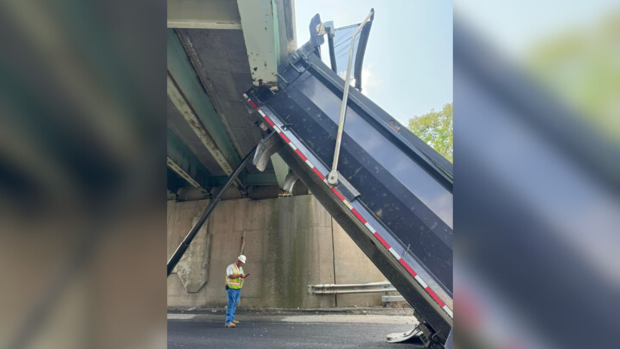 Photos show damage after truck smashes into overpass in Washington County 