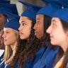 Students standing together during graduation 