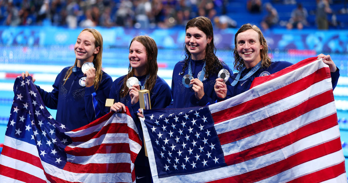 Katie Ledecky becomes most decorated U.S. female Olympian of all time after U.S. takes silver in 4 x 200m freestyle