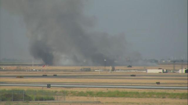 grass-fire-from-airport-raw.jpg 