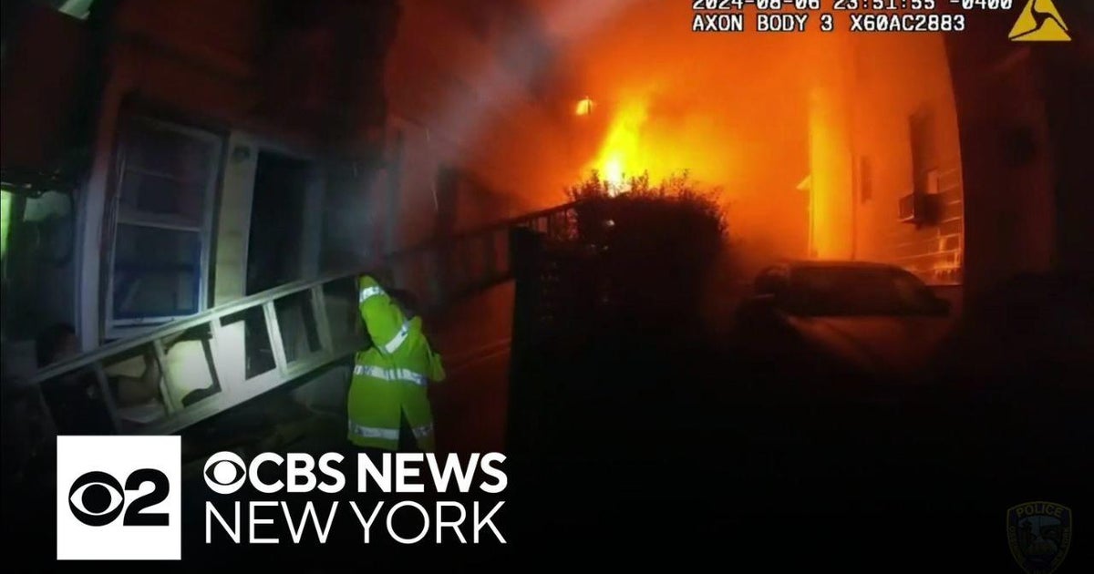 Video from body camera shows crews rescuing family from burning home in ...