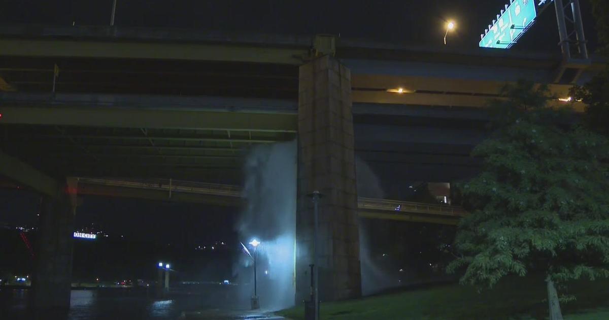 Water main break beneath Fort Duquesne Bridge sends water pouring down