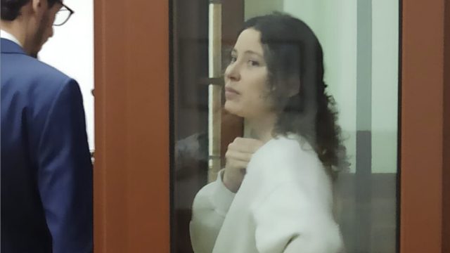 Ksenia Karelina, a dual U.S.-Russian national detained on suspicion of treason, attends a court hearing in Yekaterinburg 