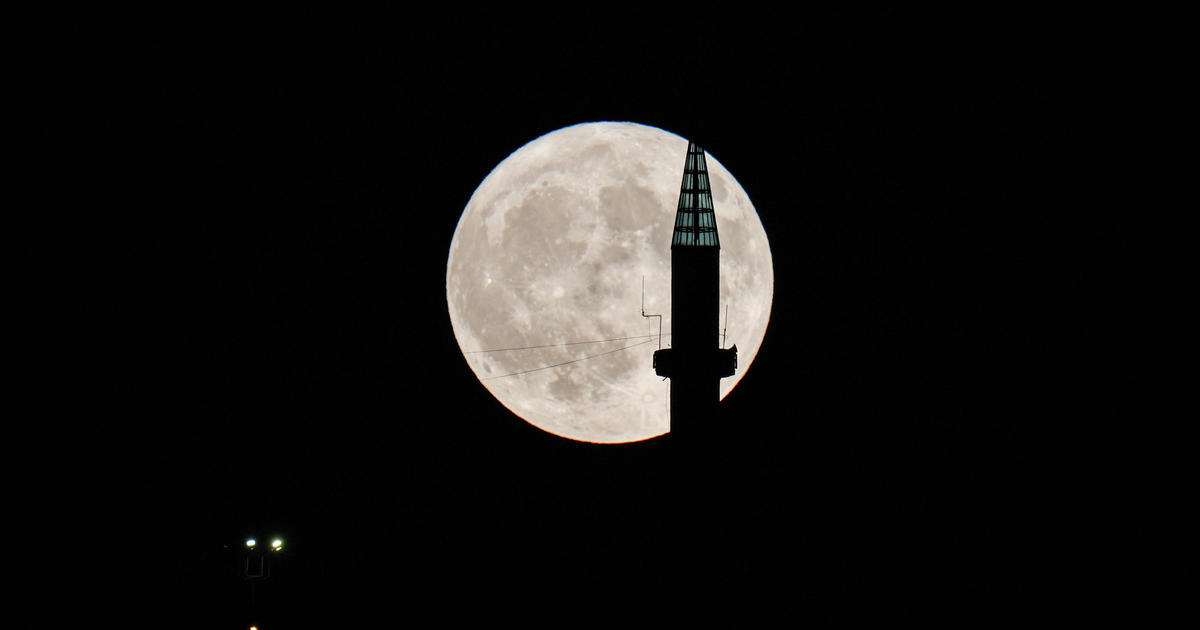 Photos of the blue supermoon show August’s rare lunar phenomenon light up the night