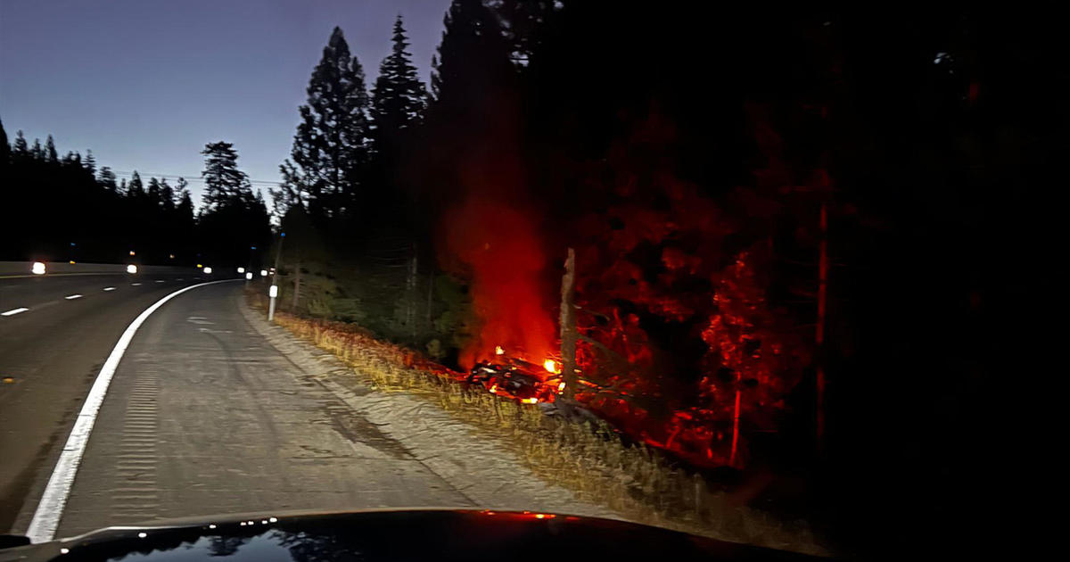 Tesla semi-trailer fire leads to closure of I-80 in California as hazardous materials operation brings traffic on Sierra Nevada highway to a standstill