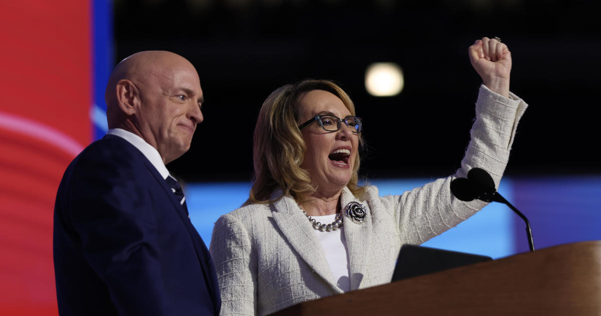 Gabby Giffords and her husband Senator Mark Kelly praise Harris in speeches to the DNC and warn of the threat posed by Trump